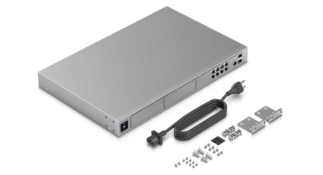 UniFi Dream Machine Pro Max com o conjunto completo de acessórios de instalação em rack de 19 polegadas, com as duas baias de armazenamento para gravação de CFTV visíveis na face frontal